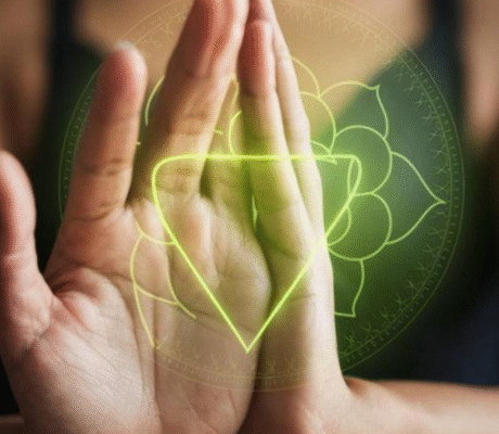 Heart Chakra Anahata energy center glowing green during meditation